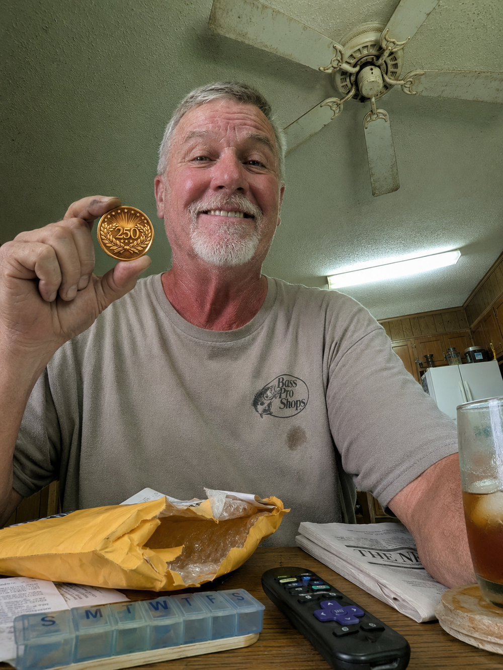Coin fresh out of its shipping envelope at the kitchen table